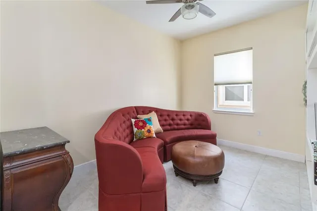 a living room with a couch and a stove