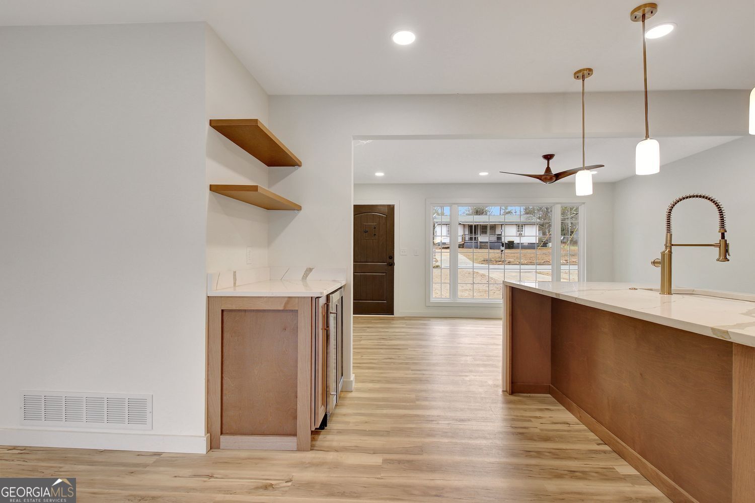 183 Pine Street Northeast Fairburn, GA 30213 - Photo 14 of 68 a kitchen with stainless steel appliances granite countertop a refrigerator and a sink