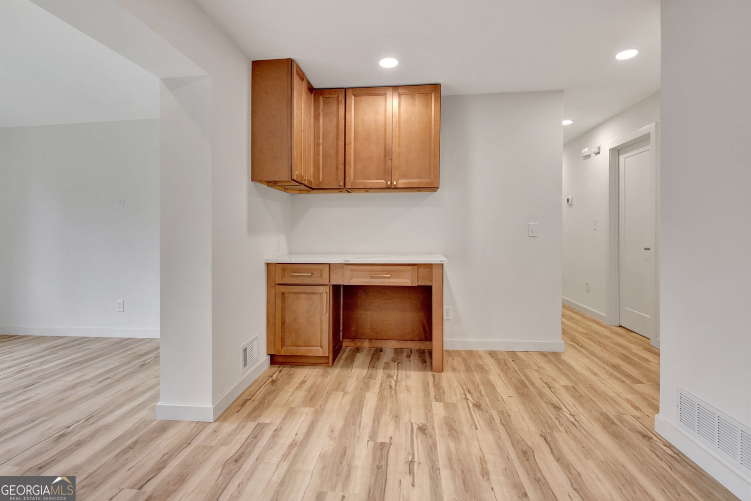 183 Pine Street Northeast Fairburn, GA 30213 - Photo 21 of 68 a view of a room with wooden floor and staircase