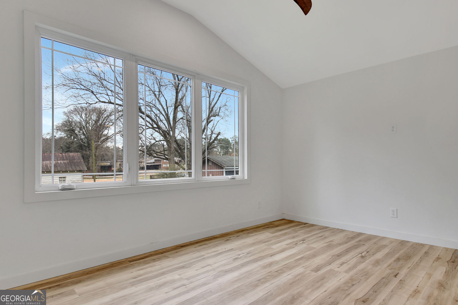 183 Pine Street Northeast Fairburn, GA 30213 - Photo 28 of 68 a view of empty room with window