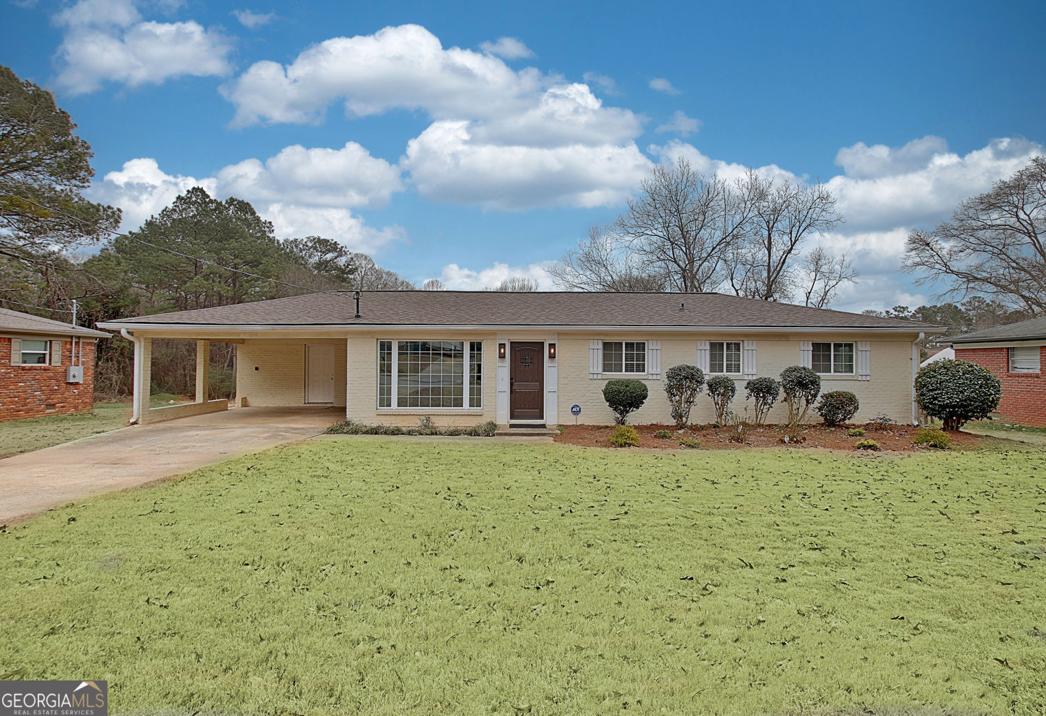 183 Pine Street Northeast Fairburn, GA 30213 - Photo 3 of 68 a front view of house with yard barbeque oven and barbeque oven