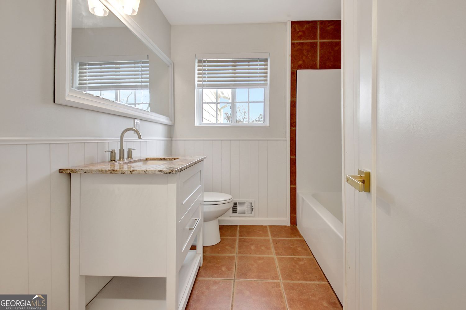183 Pine Street Northeast Fairburn, GA 30213 - Photo 48 of 68 a bathroom with a sink toilet and shower