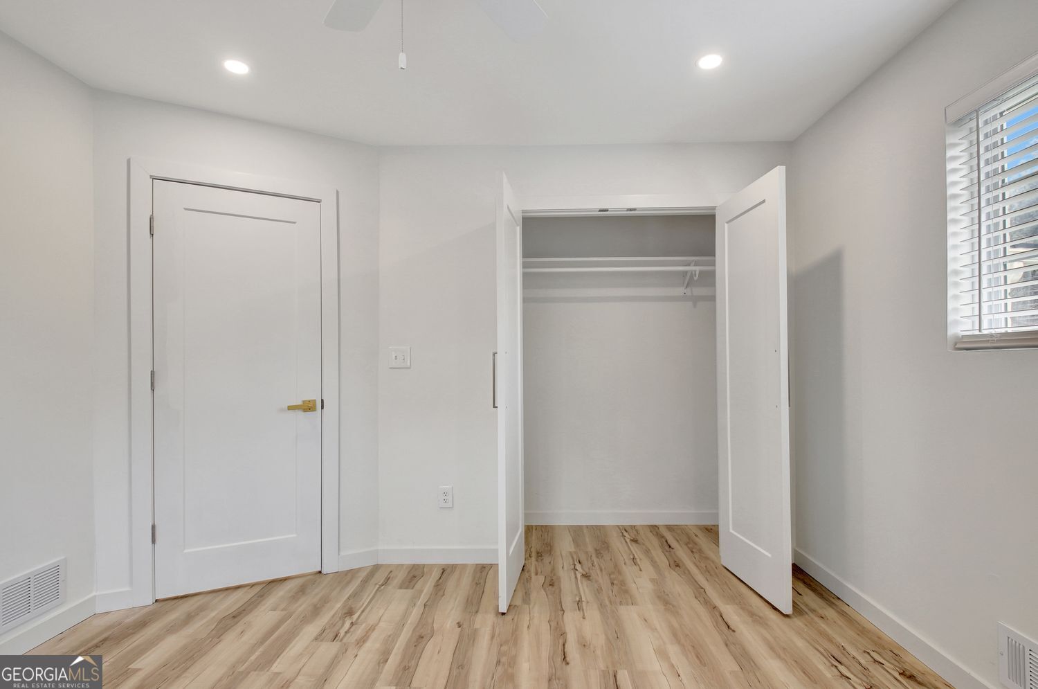 183 Pine Street Northeast Fairburn, GA 30213 - Photo 56 of 68 a view of hallway with wooden floor
