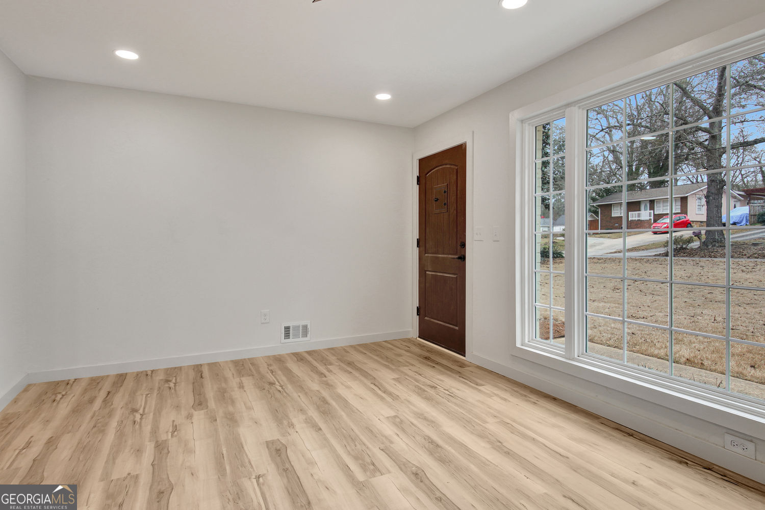 183 Pine Street Northeast Fairburn, GA 30213 - Photo 10 of 68 en empty room with window
