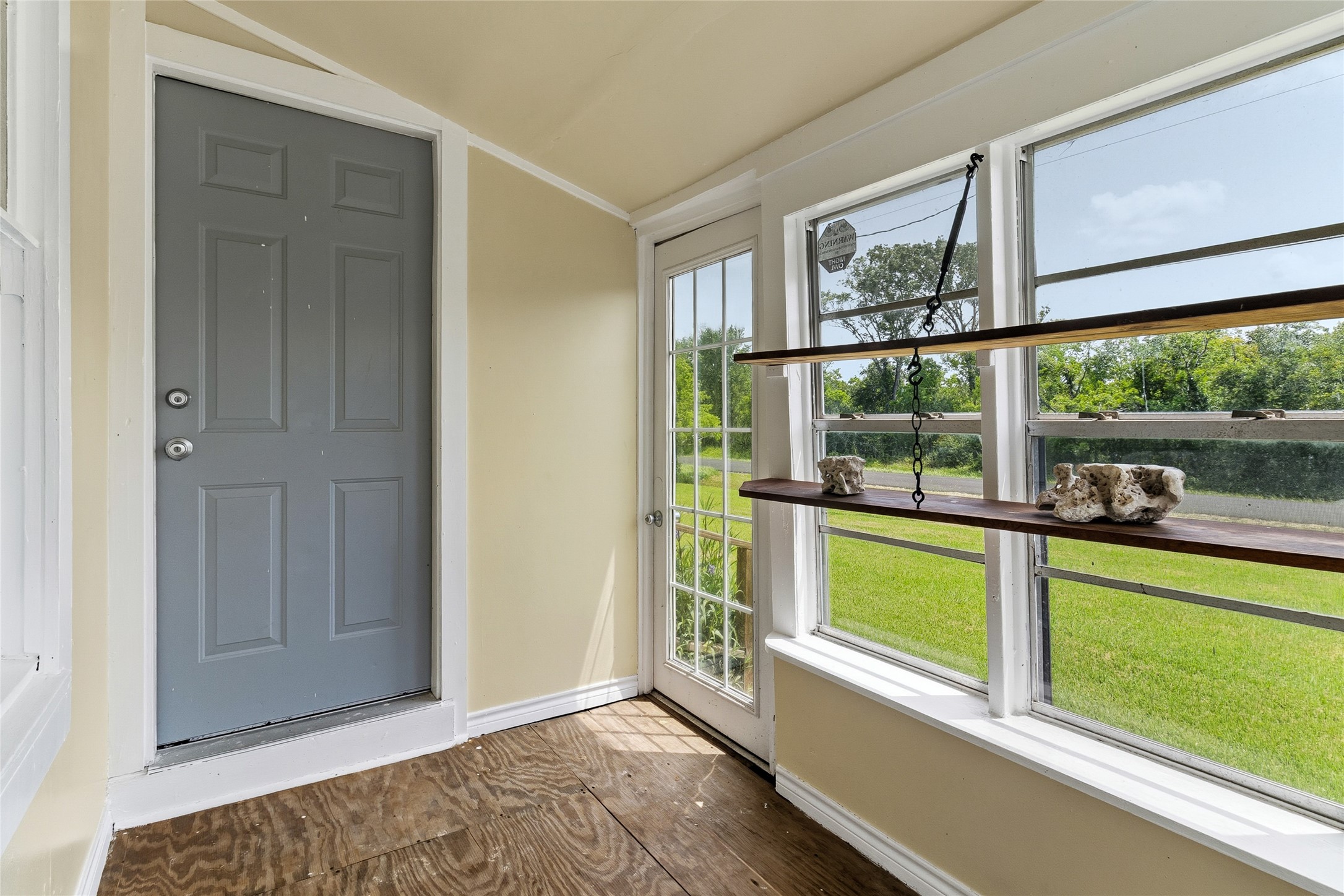 12903 Sandpiper Road Angleton, TX 77515 - Photo 4 of 19 The sunroom (10x5) offers a bright space to enjoy your morning coffee, unwind after a day outdoors, or store fishing and outdoor gear between adventures.