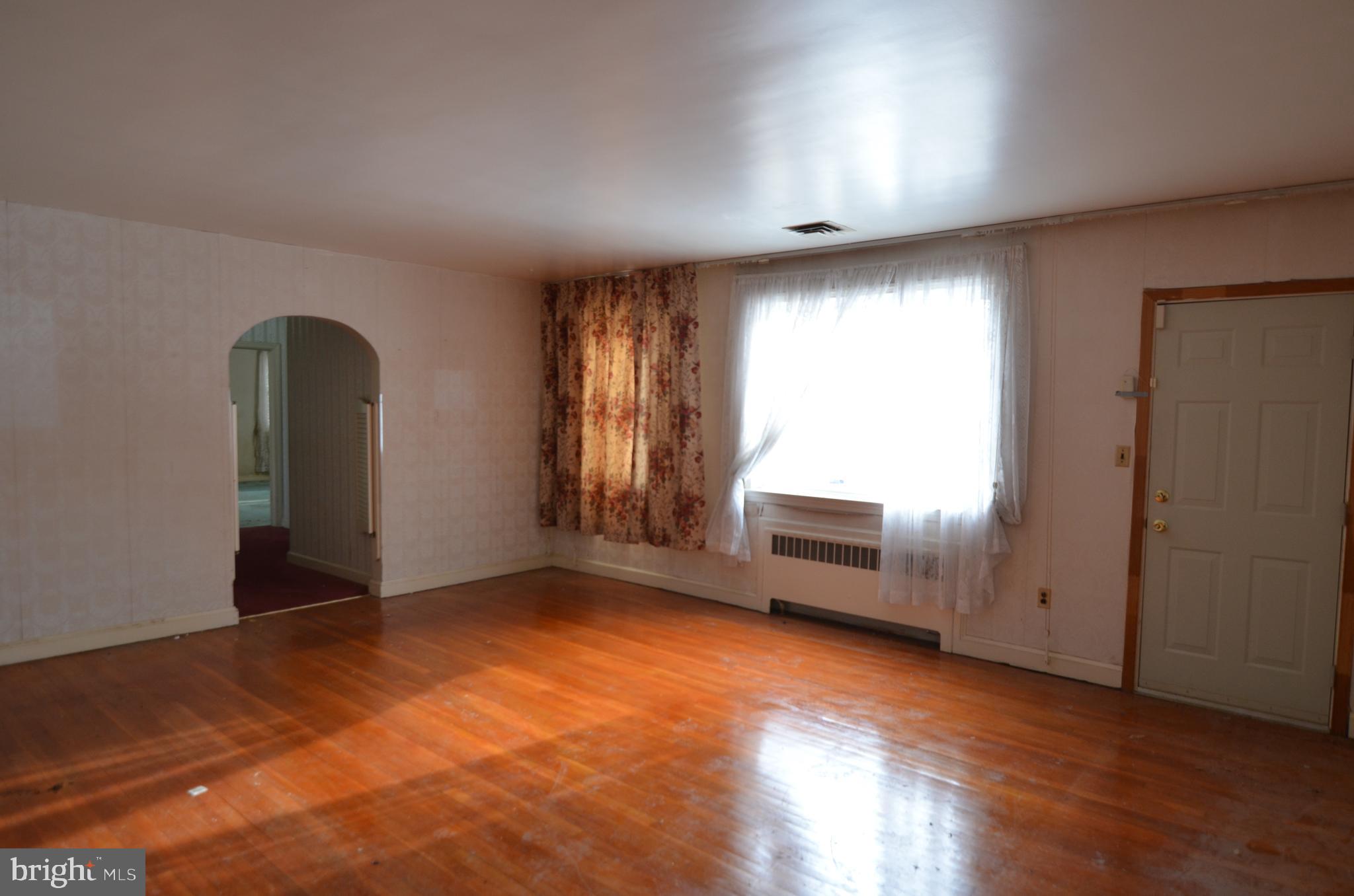 206 Shaw Avenue Silver Spring, MD 20904 - Photo 11 of 35 an empty room with windows