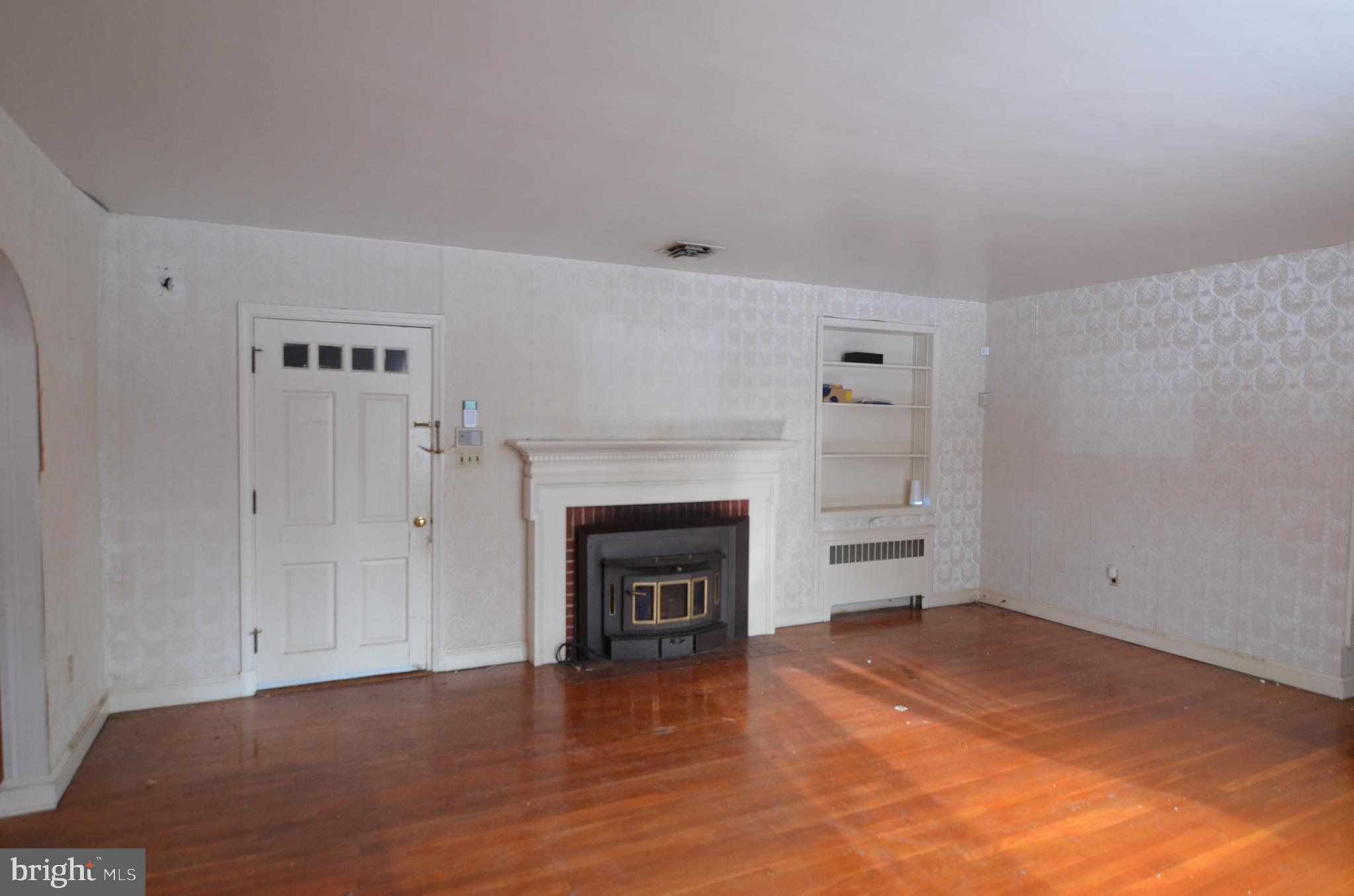 206 Shaw Avenue Silver Spring, MD 20904 - Photo 12 of 35 a view of empty room with a fireplace