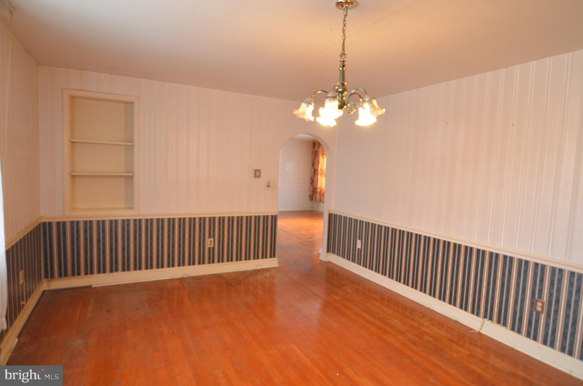 206 Shaw Avenue Silver Spring, MD 20904 - Photo 15 of 35 a view of a chandelier and wooden floor