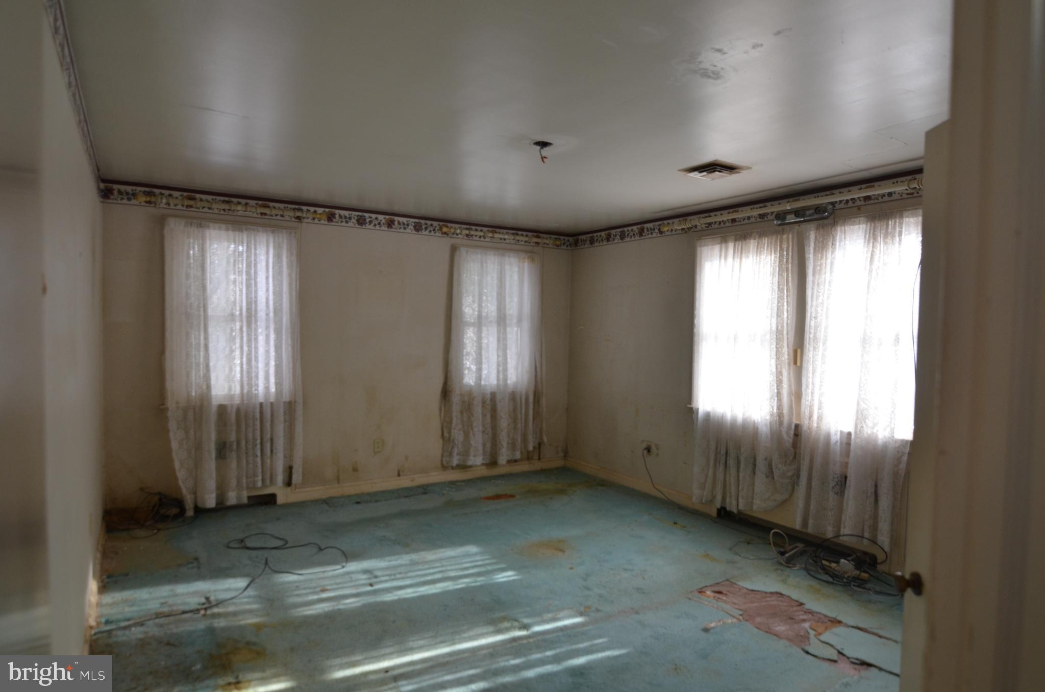 206 Shaw Avenue Silver Spring, MD 20904 - Photo 28 of 35 an empty room with windows