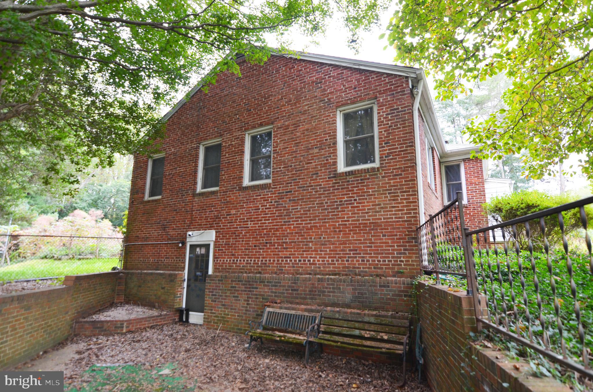 206 Shaw Avenue Silver Spring, MD 20904 - Photo 5 of 35 a backyard of a house with lots of green space