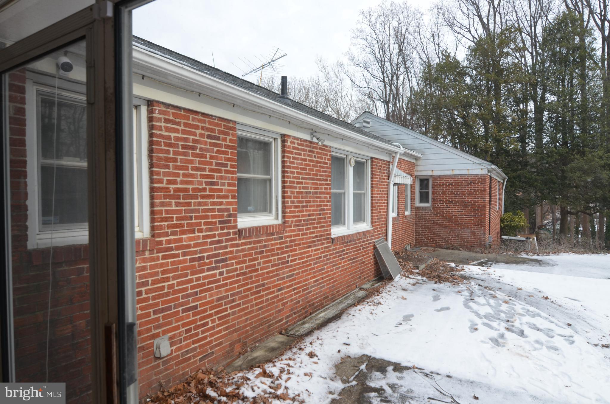 206 Shaw Avenue Silver Spring, MD 20904 - Photo 7 of 35 a view of a house with a snow on the road