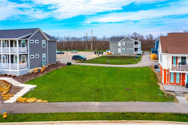 a view of a house with a big yard