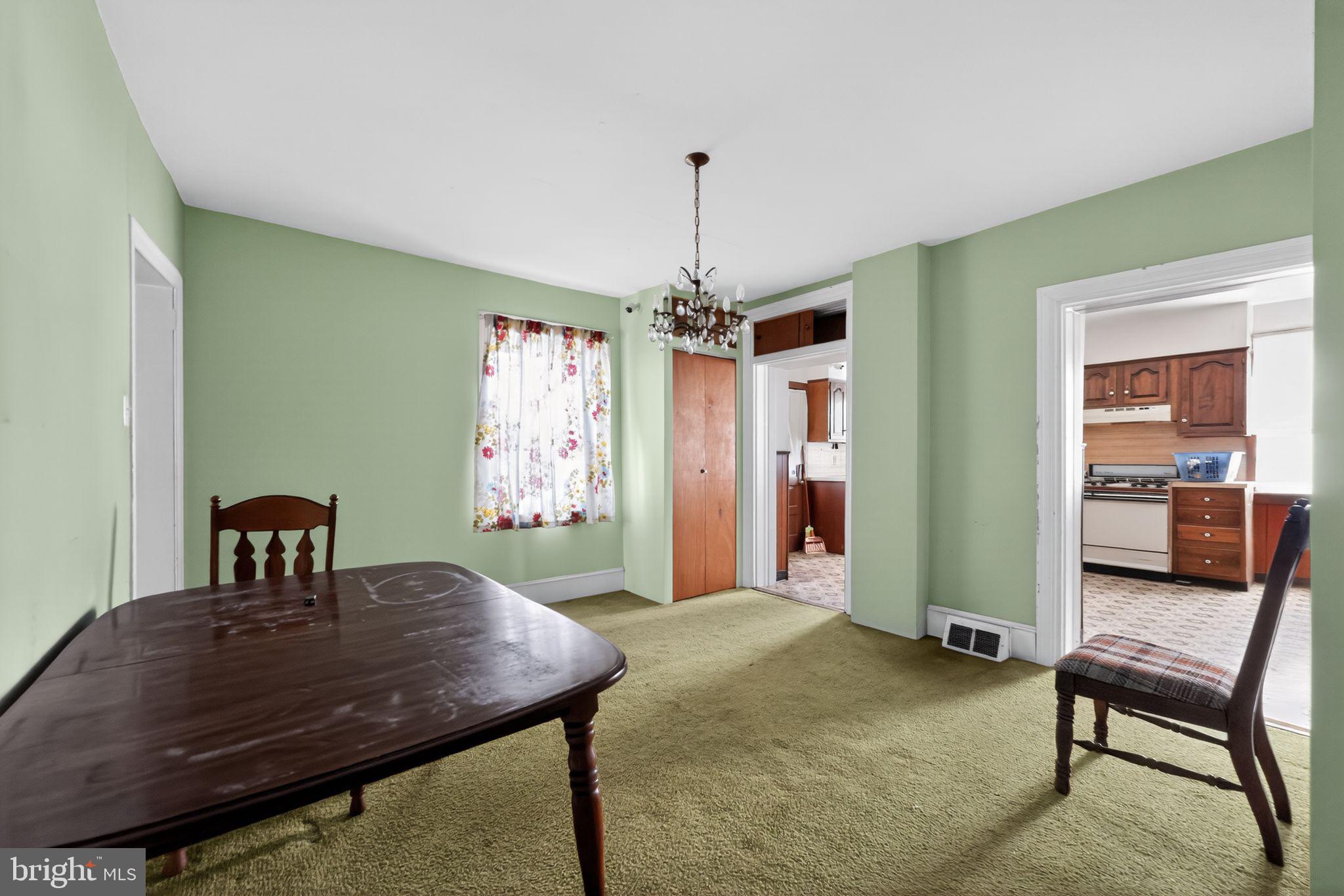 113 South Chestnut Street Ambler, PA 19002 - Photo 17 of 30 a living room with furniture and a chandelier