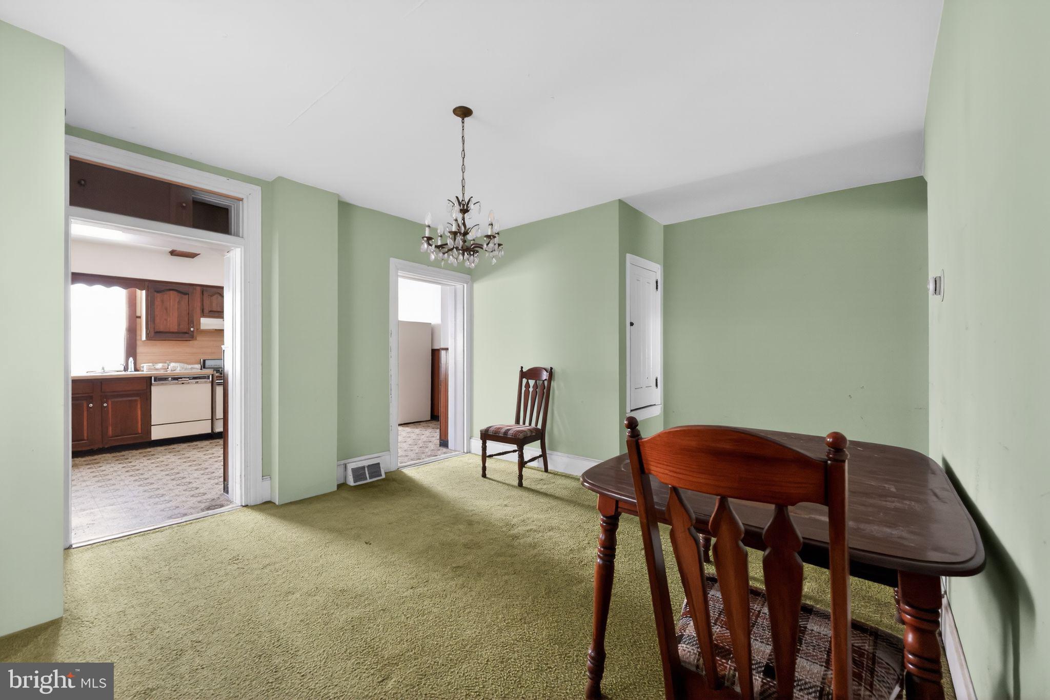 113 South Chestnut Street Ambler, PA 19002 - Photo 18 of 30 a view of a dining room with furniture and a chandelier