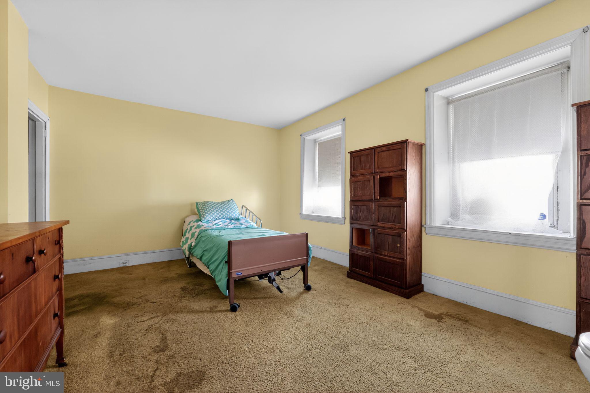 113 South Chestnut Street Ambler, PA 19002 - Photo 20 of 30 a room with furniture and window
