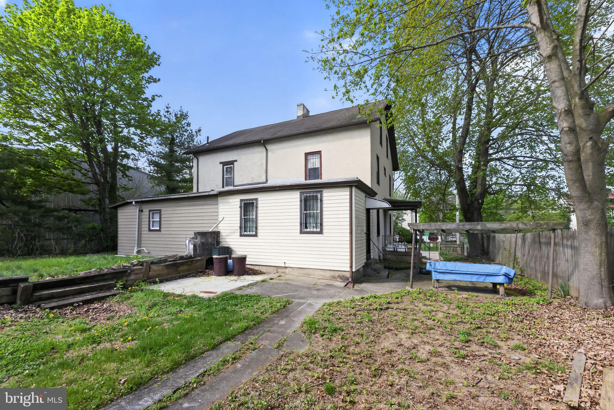 113 South Chestnut Street Ambler, PA 19002 - Photo 2 of 30 a view of a house with a yard and sitting area