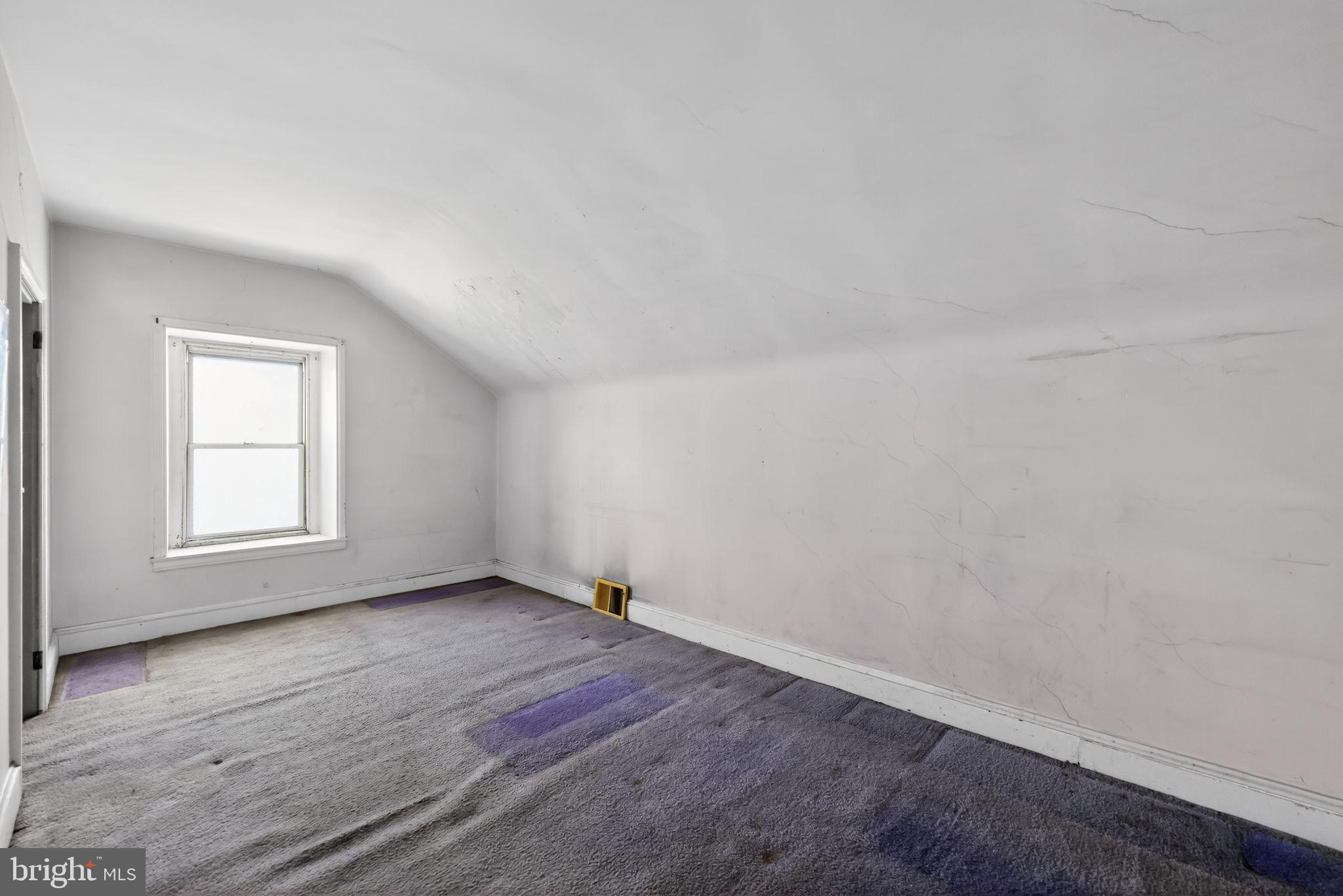 113 South Chestnut Street Ambler, PA 19002 - Photo 28 of 30 an empty room with wooden floor and windows