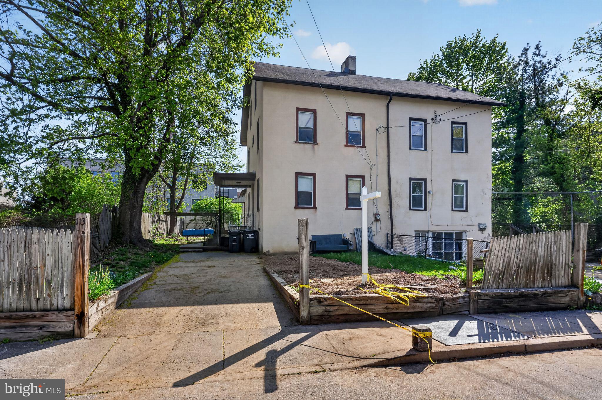 113 South Chestnut Street Ambler, PA 19002 - Photo 6 of 30 a view of a house with backyard and sitting area