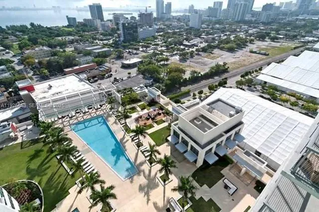an aerial view of a city with lots of residential buildings