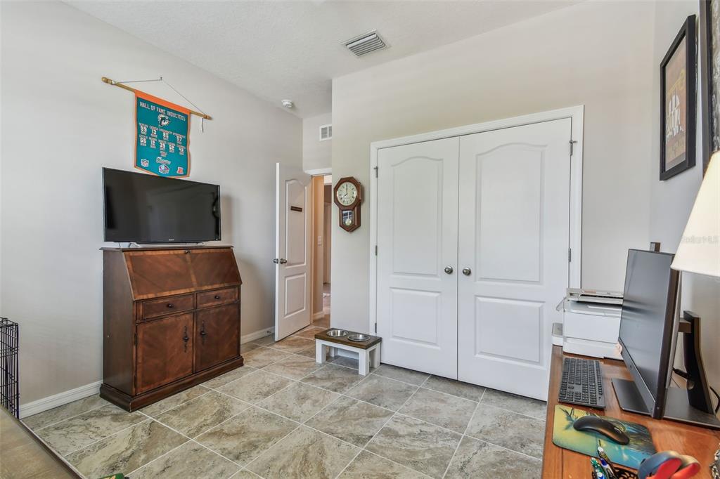6467 Seasound Drive Apollo Beach, FL 33572 - Photo 16 of 81 a living room with furniture and a flat screen tv