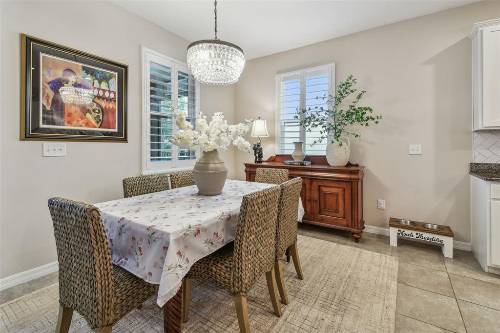 6467 Seasound Drive Apollo Beach, FL 33572 - Photo 35 of 81 a view of a dining room with furniture