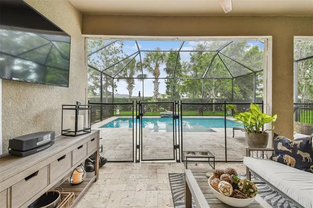 an aerial view of residential houses with outdoor space and street view
