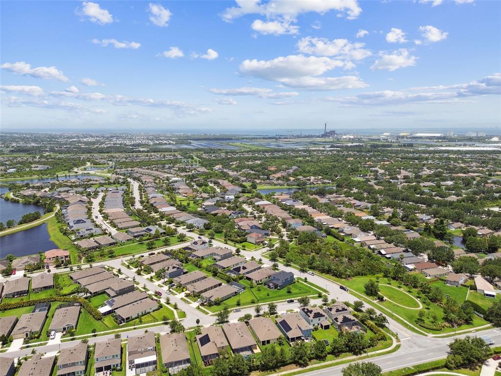6467 Seasound Drive Apollo Beach, FL 33572 - Photo 71 of 81 an aerial view of residential building with green space