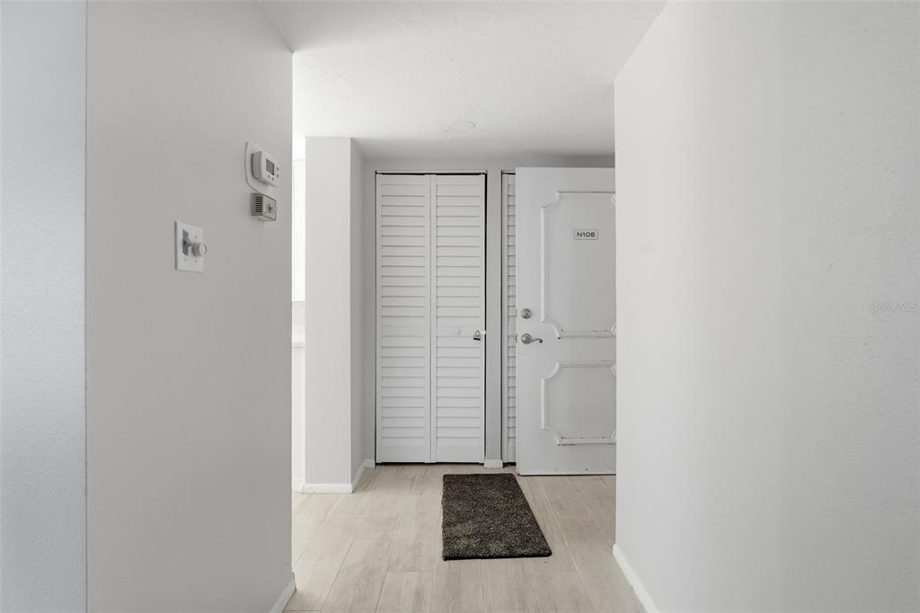 4440 Exeter Drive, Unit 106 Longboat Key, FL 34228 - Photo 3 of 26 a view of an empty room with closet and a window