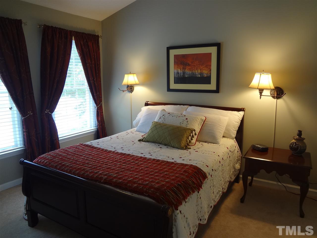 5276 Fairmead Circle Raleigh, NC 27613 - Photo 11 of 25 a bedroom with a bed and a window
