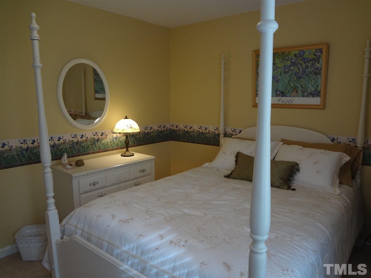 5276 Fairmead Circle Raleigh, NC 27613 - Photo 18 of 25 a spacious bathroom with a tub sink and mirror