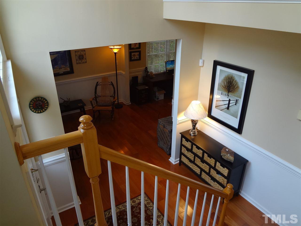 5276 Fairmead Circle Raleigh, NC 27613 - Photo 23 of 25 a view of stairs and wooden floor