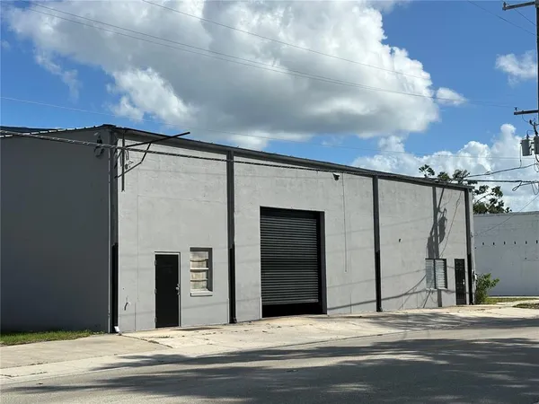 a view of a house with a street