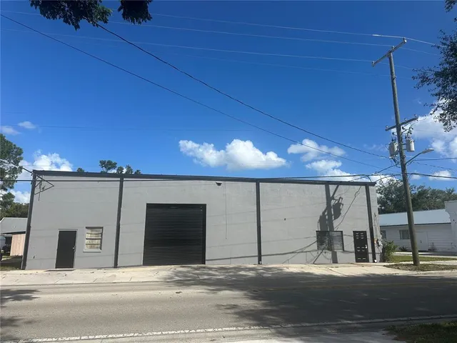 a view of a house with a street