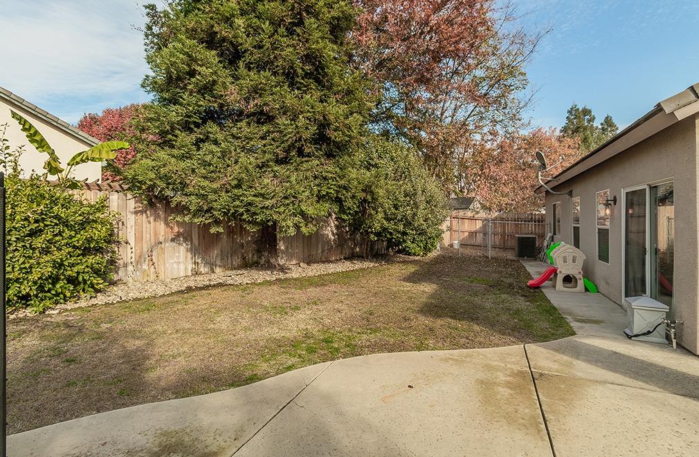 2074 East Revere Road Fresno, CA 93720 - Photo 29 of 39 a view of a street with some trees