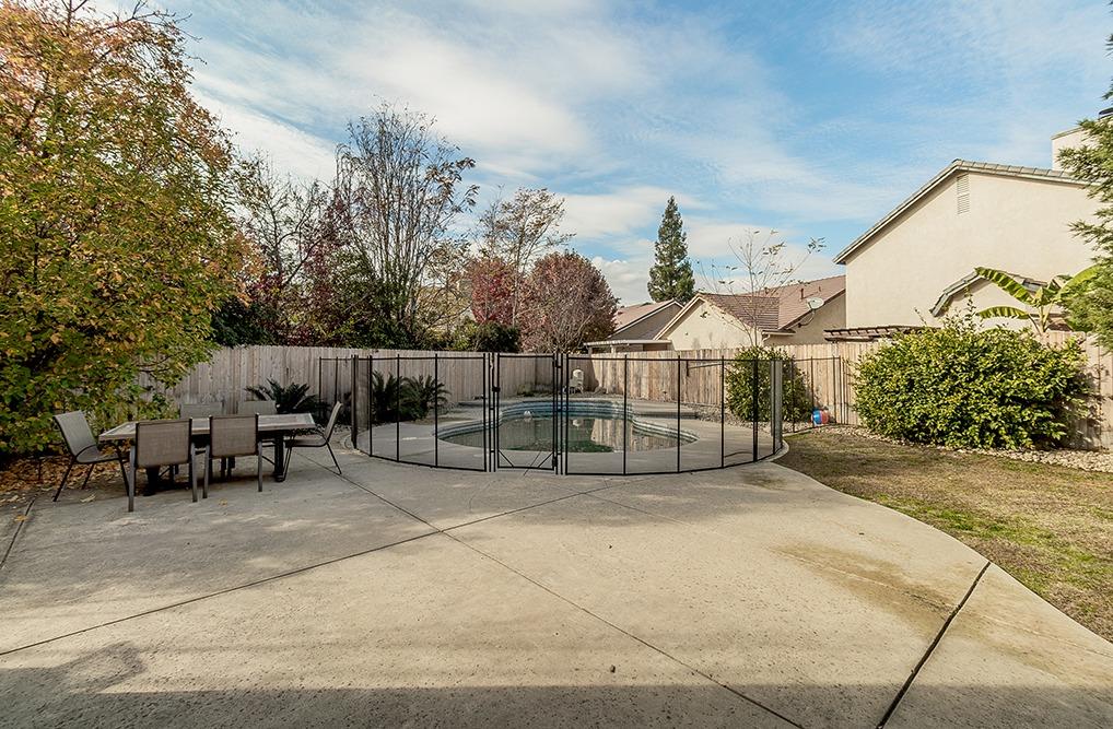 2074 East Revere Road Fresno, CA 93720 - Photo 30 of 39 a view of a backyard