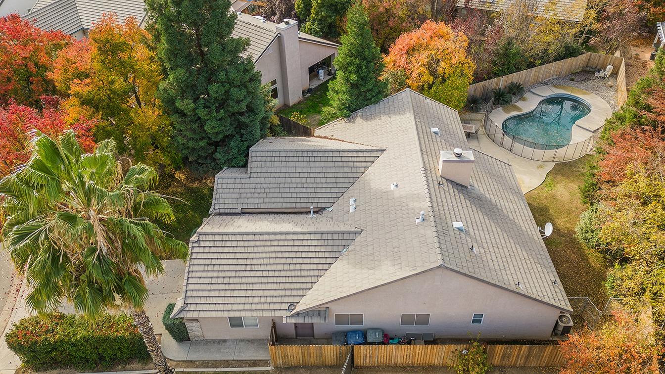 2074 East Revere Road Fresno, CA 93720 - Photo 39 of 39 a aerial view of a house with a yard and potted plants