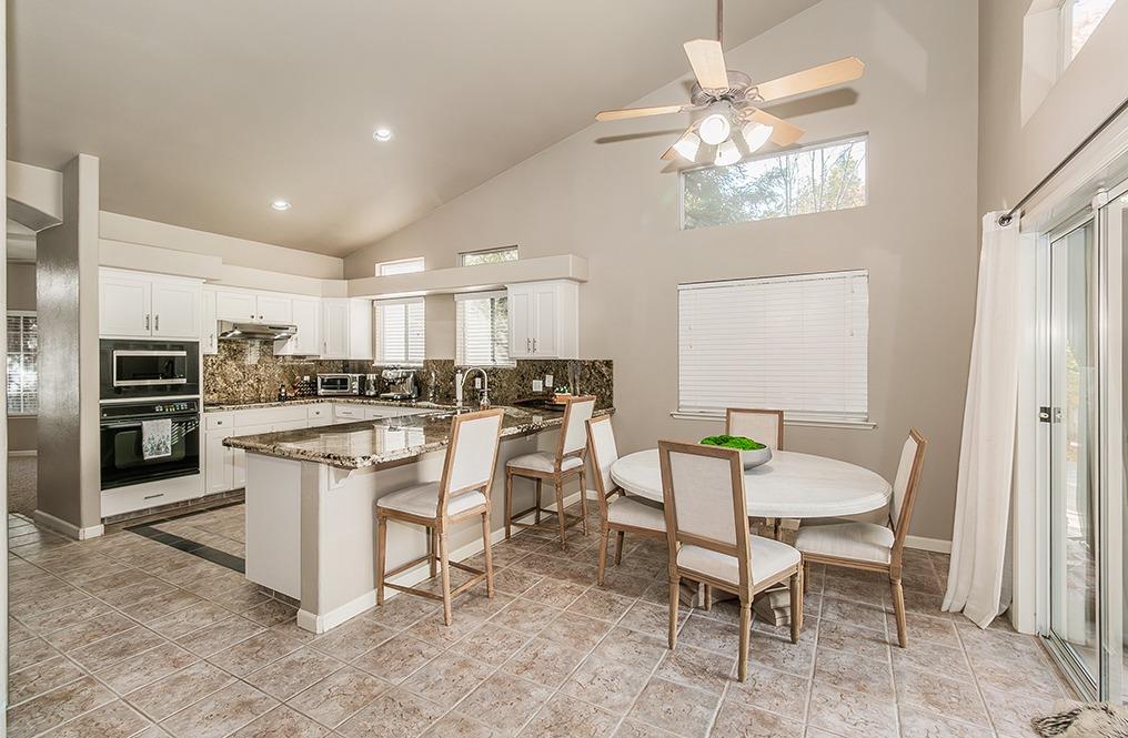 2074 East Revere Road Fresno, CA 93720 - Photo 7 of 39 a view of kitchen with microwave and cabinets