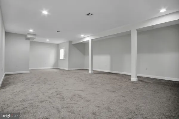 an empty room with an entryway