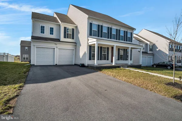 a view of a house with a swimming pool