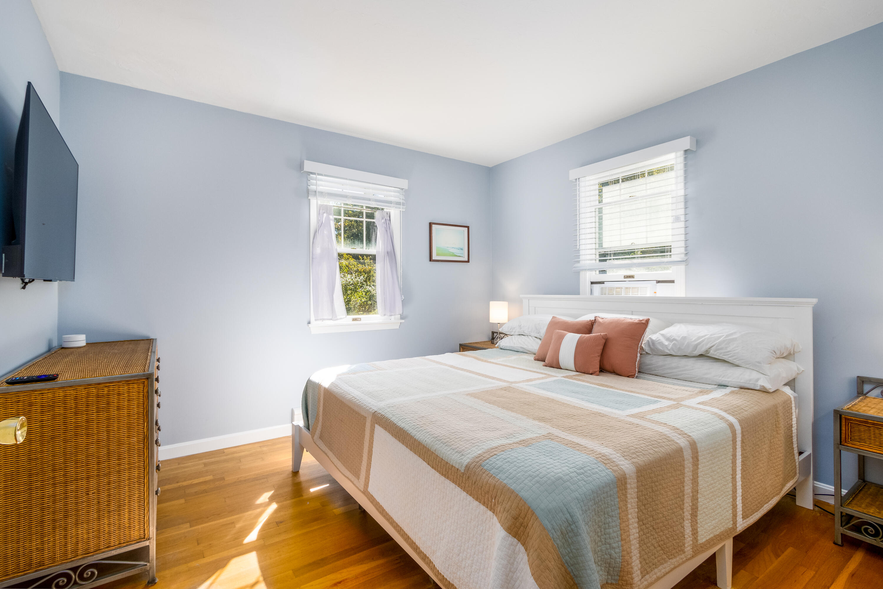9 Honeysuckle Lane Orleans, MA 02653 - Photo 13 of 26 a bedroom with a bed and flat screen tv