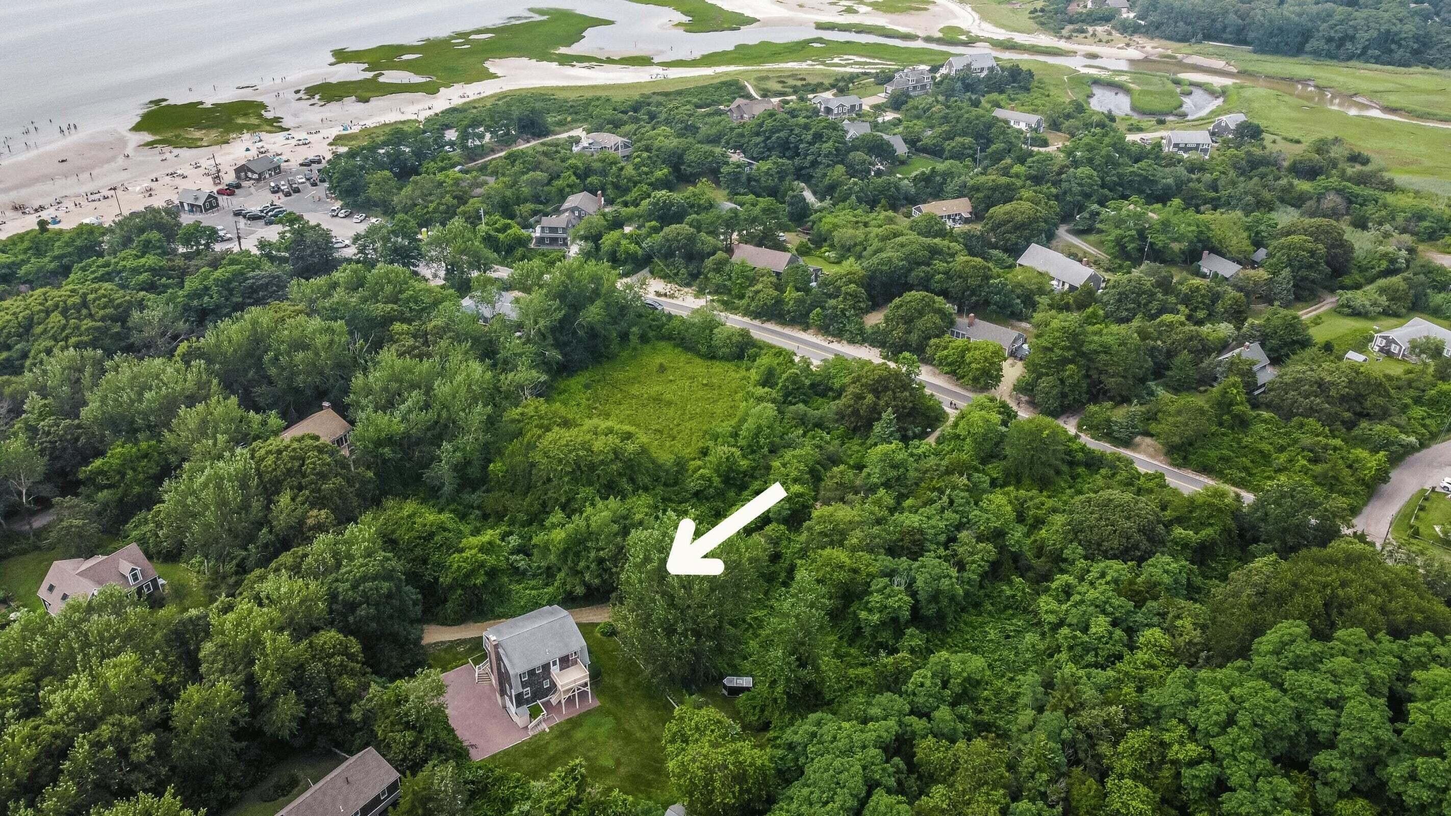 9 Honeysuckle Lane Orleans, MA 02653 - Photo 2 of 26 an aerial view of residential house with outdoor space and trees all around