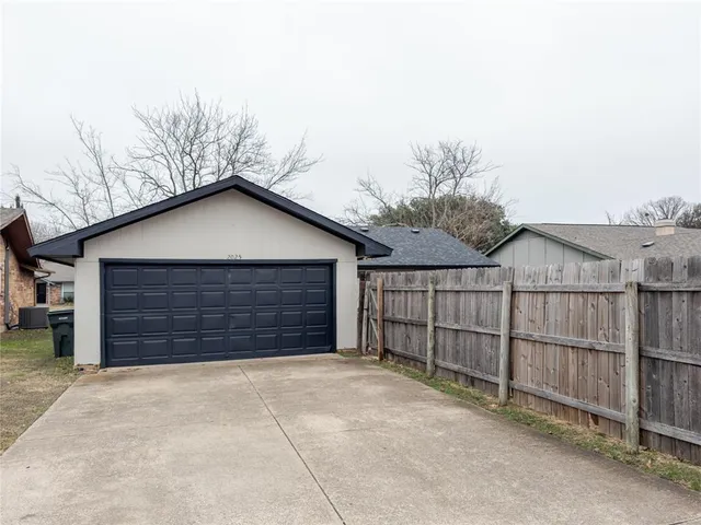 a view of barn with a small yard