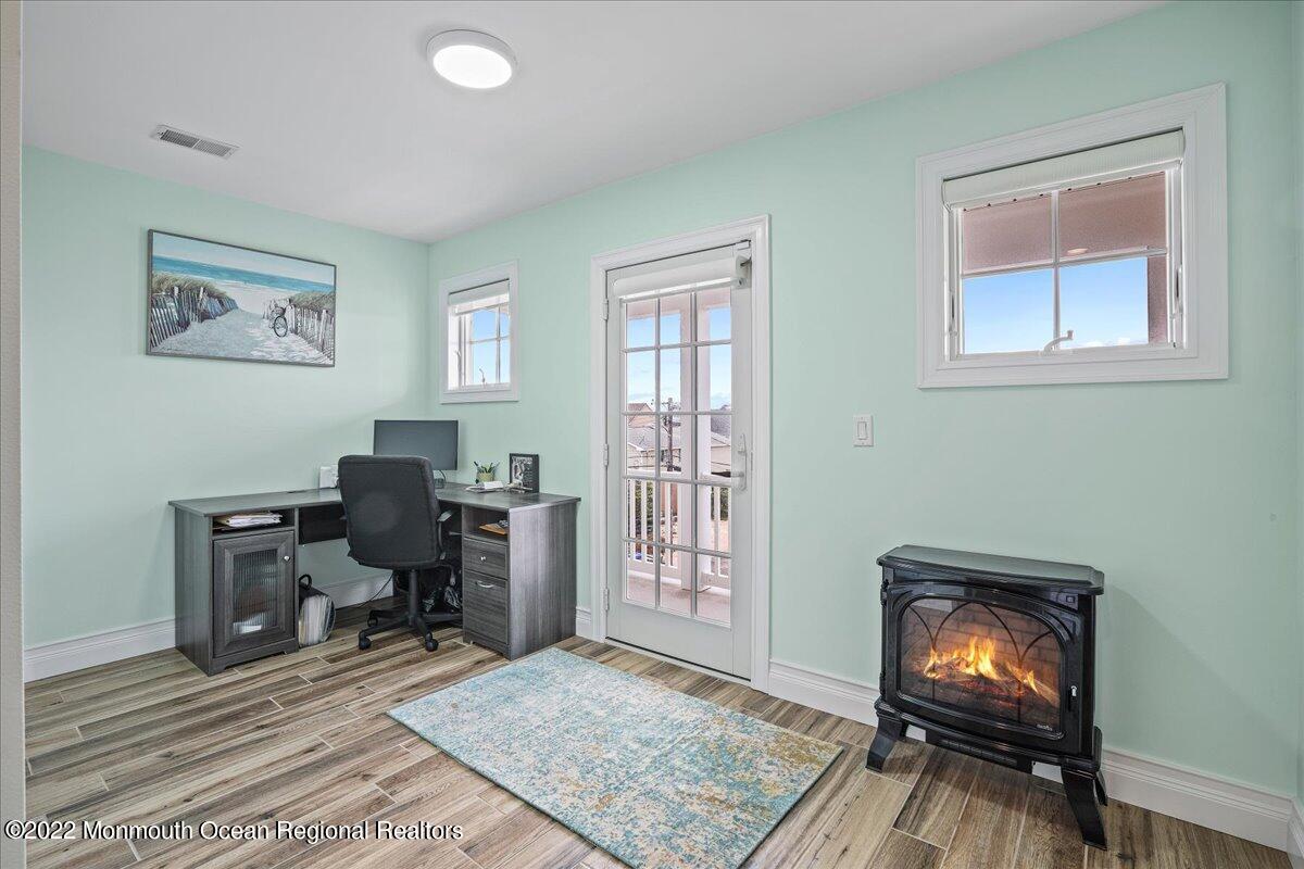 35 Channel Road Toms River, NJ 08753 - Photo 21 of 41 a view of a workspace with furniture and a window