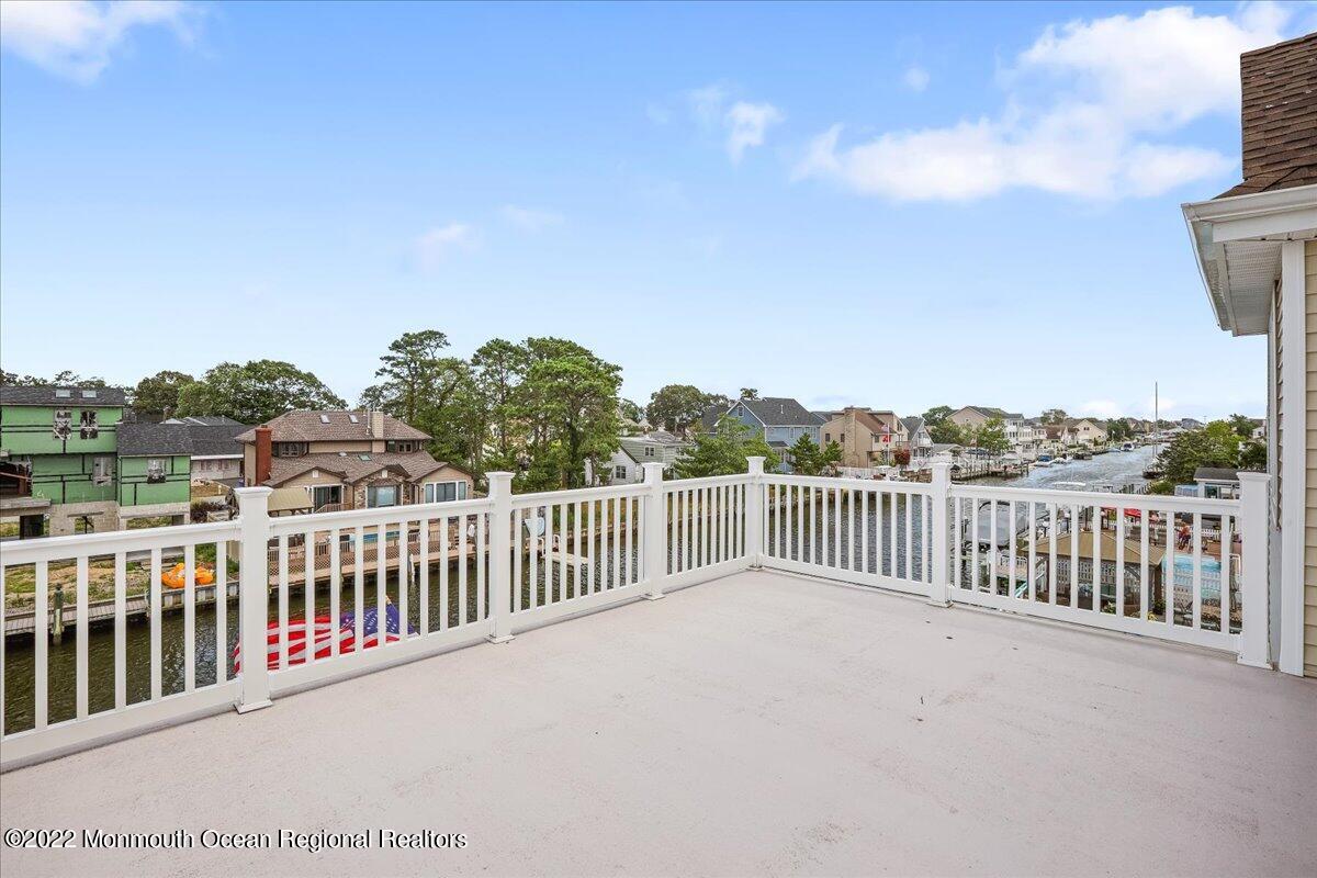 35 Channel Road Toms River, NJ 08753 - Photo 26 of 41 a view of a balcony with yard