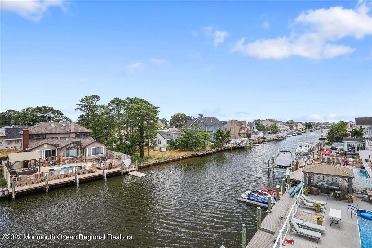 35 Channel Road Toms River, NJ 08753 - Photo 27 of 41 a view of a lake with houses