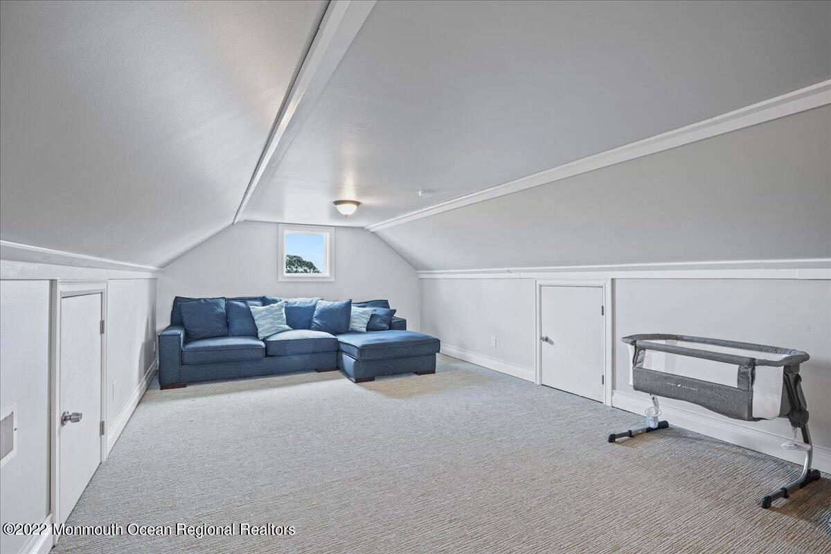 35 Channel Road Toms River, NJ 08753 - Photo 29 of 41 a living room with furniture and a ceiling fan