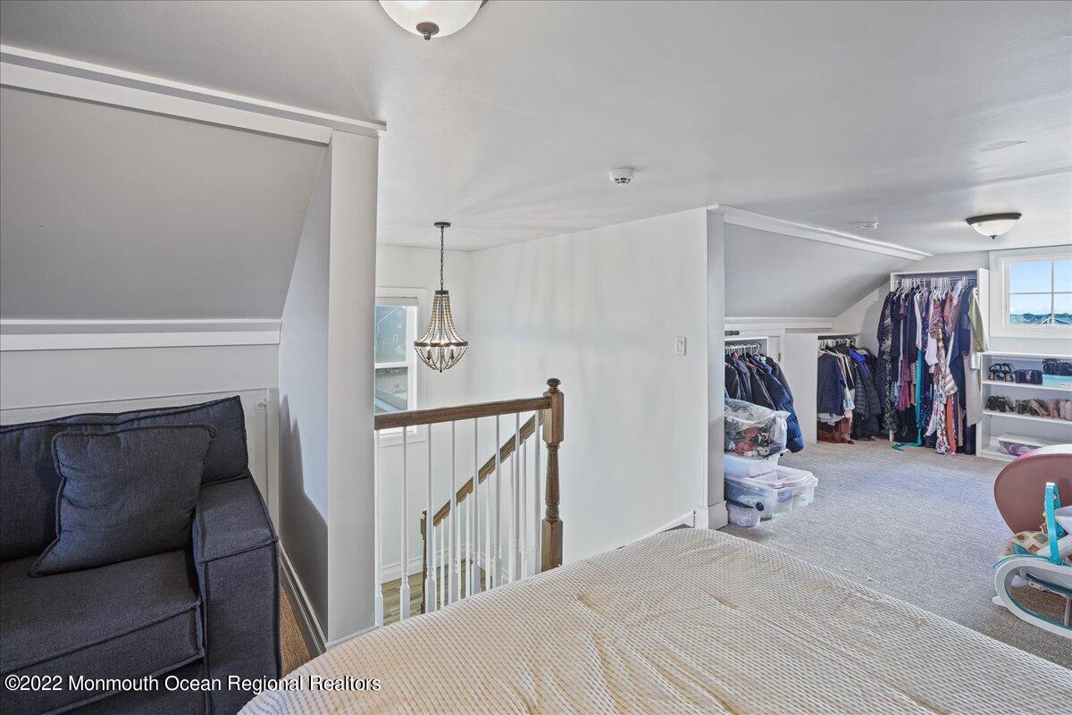 35 Channel Road Toms River, NJ 08753 - Photo 30 of 41 a bedroom with furniture and a wooden floor