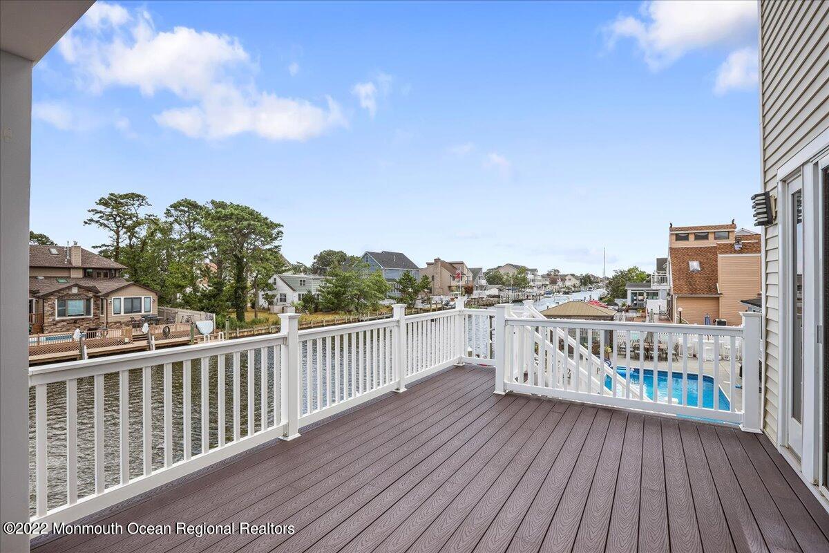 35 Channel Road Toms River, NJ 08753 - Photo 32 of 41 a view of a balcony with wooden floor