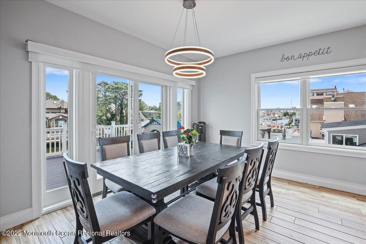 35 Channel Road Toms River, NJ 08753 - Photo 6 of 41 a view of a dining room with furniture window and wooden floor