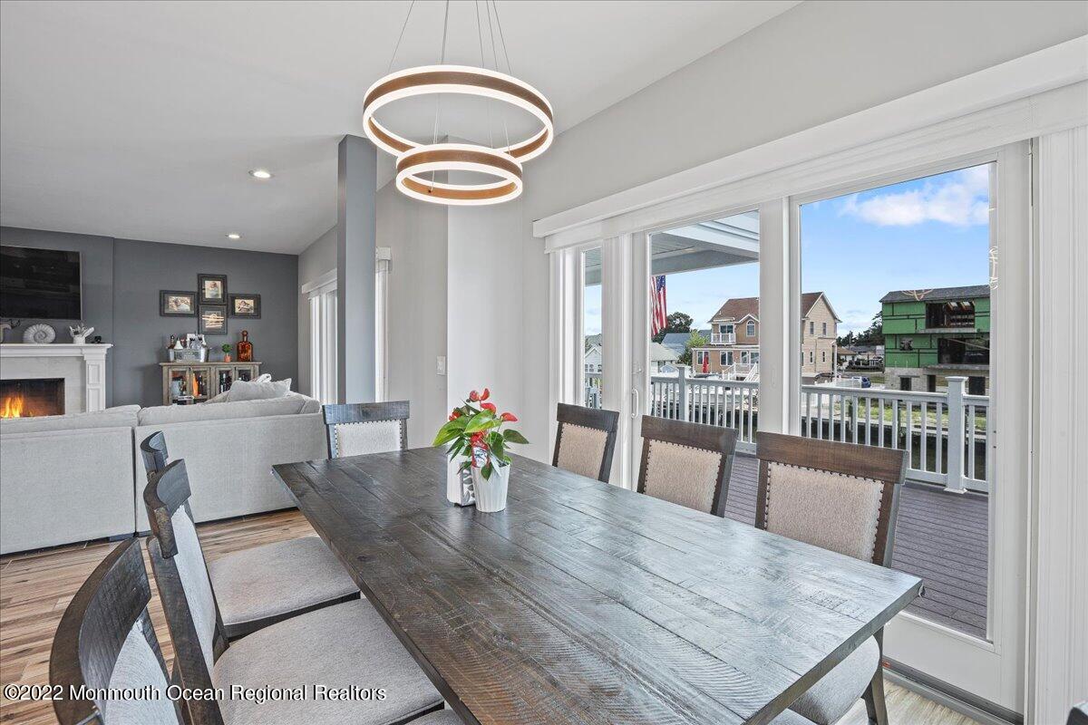 35 Channel Road Toms River, NJ 08753 - Photo 7 of 41 a view of a dining room with furniture and wooden floor